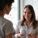 A nutritionist consulting with a client, pointing to a diet plan.